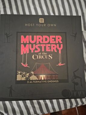 Host. Your Own "Murder Mystery at the Circus" Game - Black & Red Box